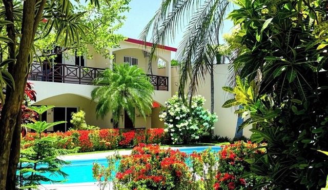 Relax & Explore: Cozy 2BR with Pool Parking & WiFi