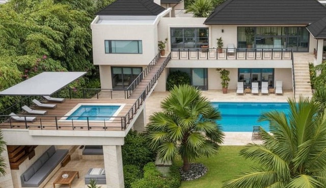 Villa Espada: Grand 8-Bedroom Estate w/pools, Eden Roc beach club, staff & golf carts in Punta Cana