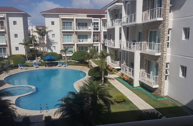 Family-friendly 3BD central Sosua condo wih large pool, WIFI, BBQ, A/C, Cable TV in Sosúa