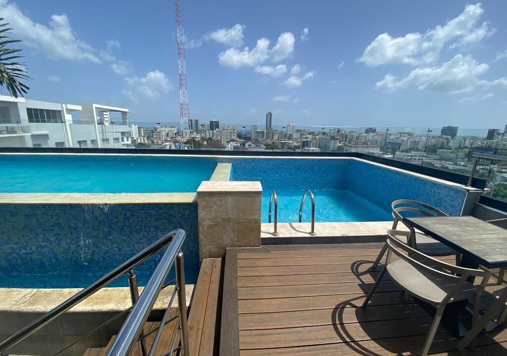 Ensanche Quisqueya Apartment | Luxurious Downtown Apt, Rooftop Pool, Gym