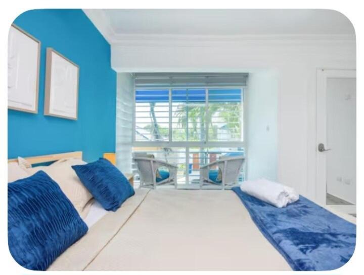 Juan Dolio - El Pueblo Apartment | Upgrade A Primera Linea De Playa Con Hermosas Áreas Sociales Frente Al Mar -Beach-Pool-Jacuzzi-BBQ-Gazebos-WiFi-Parking-Control De Acceso Seguridad Las 24 Horas-Al Lado De Hoteles-Restaurantes-Minimarkets