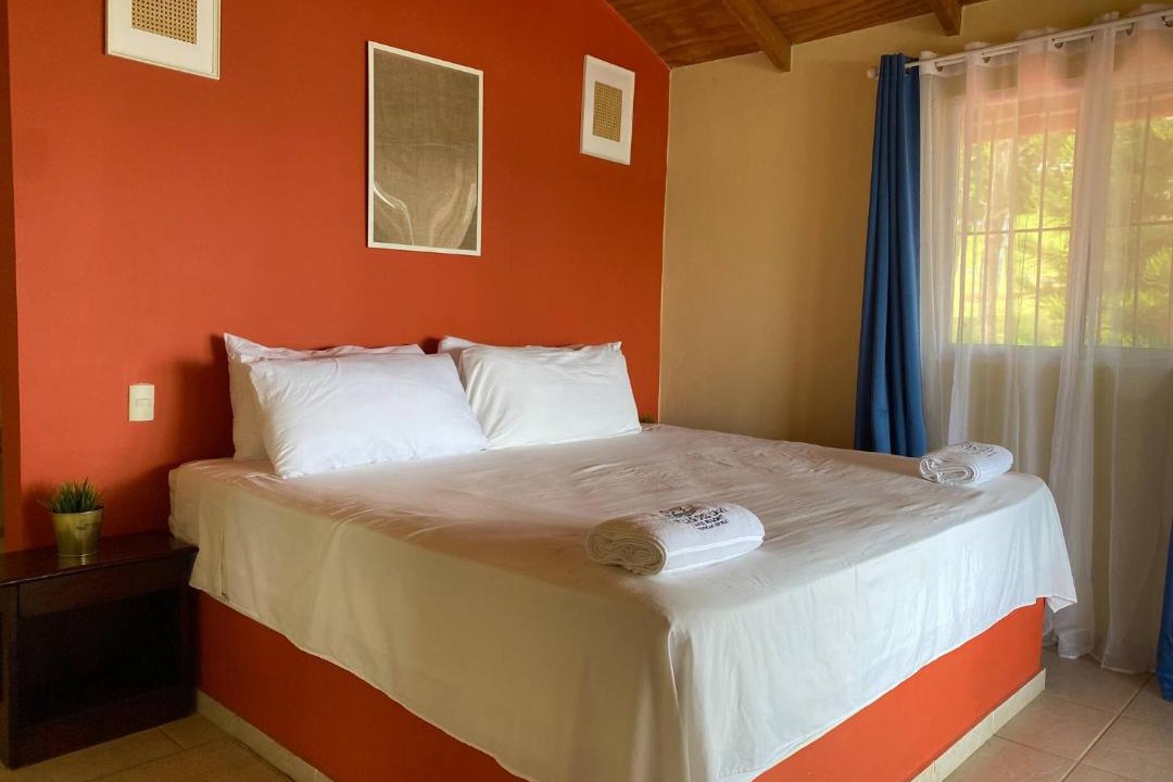 Yaque Arriba House | Villas Del Lago Resort King Room Upper Floor