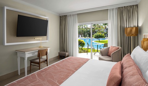 Standard Room, 1 King Bed (Tropical View | Pool Walk Out)
