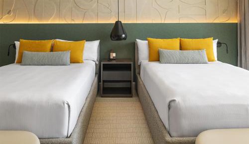 Queen Room with Two Queen Beds, Plunge Pool and Partial Beach View