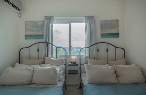 Ensanche Isabelita Apartment | Escape Oceanview Condo Next to Avenida Espana