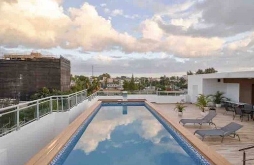 Los Rios Condo | Luxury 2 beds apt. Pool+Gym. Near CIPLA and CCEP