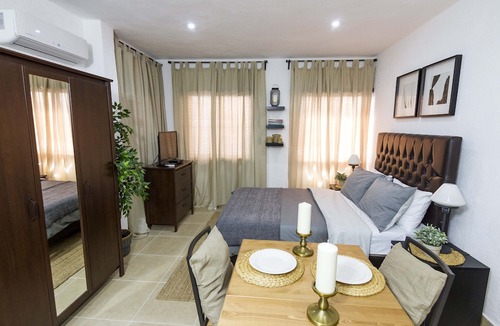Gascue Apartment | Splendid two bedrooms Colonial loft with Roof Top Terrace