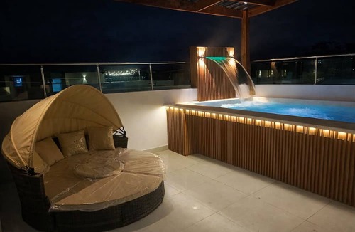 Santiago Province Apartment | Modern Rooftop Penthouse Private Jacuzzi for 12