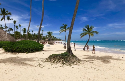 Bavaro Condo | NEW CONDO ON GOLF COURSE WITH PRIVATE CLUB BEACH