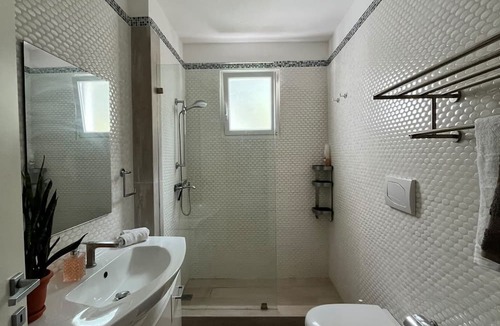 Dominicus Apartment | Sunset Paradise Tracadero Apartment: Sea pools access Private Garden WorkSpace