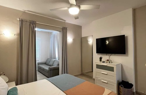 Dominicus Apartment | Sunset Paradise Tracadero Apartment: Sea pools access Private Garden WorkSpace