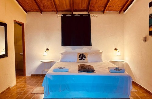 Yaque Arriba Bed & Breakfast | Villas Del Lago Resort – King Room | Upper Floor