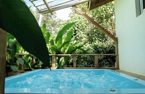 Sanchez Apartment | Tropical Getaway: Bungalow with Jacuzzi and Pool