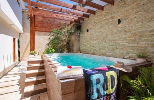 El Batey House | Getaway room with shared Jacuzzi in the center