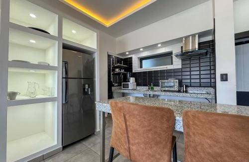 El Batey Hotel | Rizz Suites by Instyle near Sosua Beach with Pool & 24h GYM
