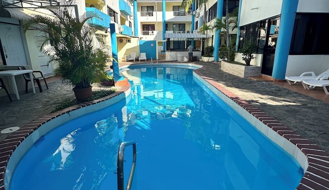 Charming 2-bedroom Neon apartment in Sosúa with AC, WiFi, Pool in Sosúa